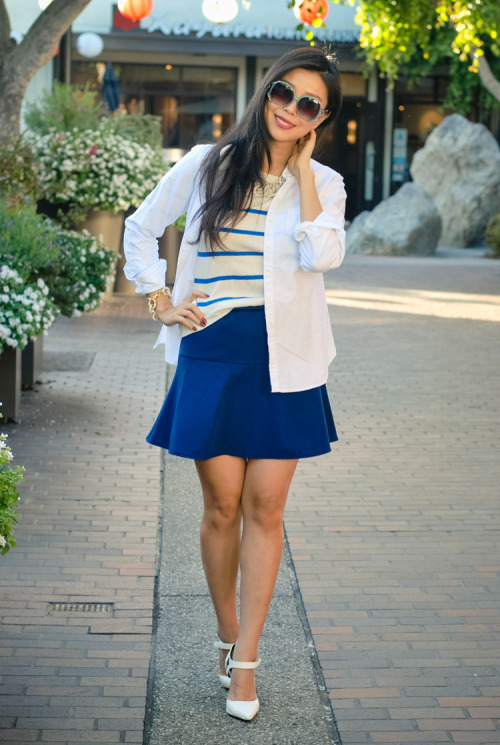 @goodbadfab incorporates the Nautical trend into her look with stripes and navy. Read more here