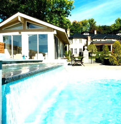 Montreal PoolhouseInspiration For A Mid-sized, Modern Backyard Renovation With A Rectangular Pool House