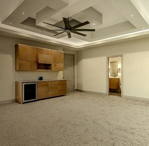 Austin Family RoomExample Of A Large, Open-concept, Minimalist Game Room With A Carpeted Floor And A