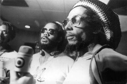 Junior Murvin, Jacob Miller & Bob Marley being interviewed at the Santos Dumont Airport in Brazi