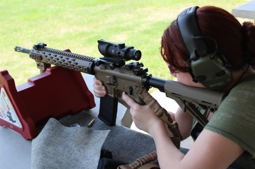 thearmednovelist:  Range day today with bottled-butterfly. We were shooting a buddy’s 16-inch Yankee Hill AR-15 rifle. Our love for ACOGs grew exponentially. 