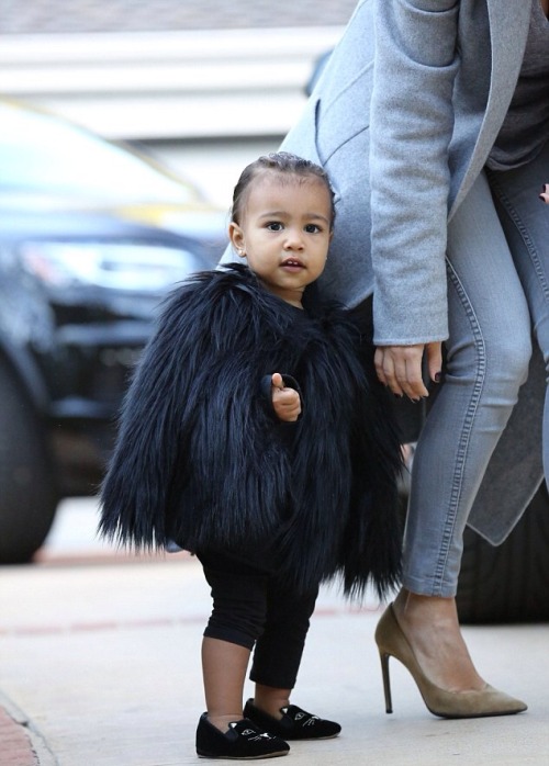 yeezusbound2:Kim and North arriving at a friends house in Beverly Hills.(11/28/14)