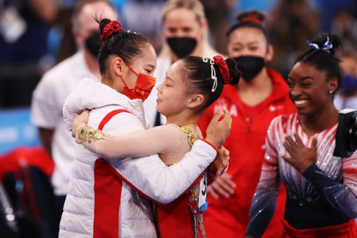 agathacrispies: Guan Chenchen of Team China celebrates with her silver medalist teammate, Tang Xijin