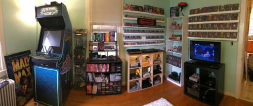 8bitrevolver:  fujicucumber:  8bitrevolver:  Retro Game Room Version 2 I needed to patch the walls and paint, so I thought I might as well change it all up.  23 different consoles and handhelds, about 450 old games. Framemeister xrgb-mini upscaler so