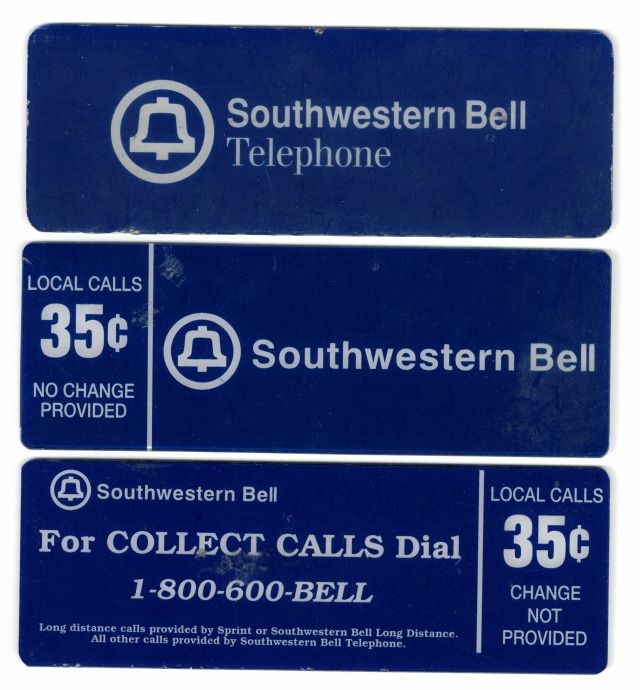 Three upper payphone instruction plates from Southwestern Bell. This are all dark blue with white text
Top: 
Southwestern Bell Telephone 
Middle: 
(Left): 
LOCAL CALLS 
35¢ 
NO CHANGE PROVIDED 
(Right) 
Southwestern Bell 
Bottom: 
(Left) 
Southwestern Bell 
For COLLECT CALLS Dial 
1-800-600--Bell 
Long distance calls provided by Sprint or Southwestern Bell Long Distance. 
All other calls provided by Southwestern Bell Telephone.
(Right) 
LOCAL CALLS 
35¢ 
CHANGE NOT PROVIDED