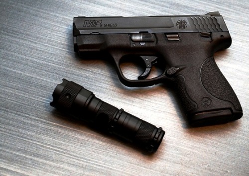 gunsknivesgear:  How to Choose A Defensive Handgun, Part VI: 9mms and .38s If you prize rapid fire and accuracy over power, you might like the .38 or the 9mm.  Above is a good example of a 9mm, the Smith & Wesson MP Shield.      I personally prefer