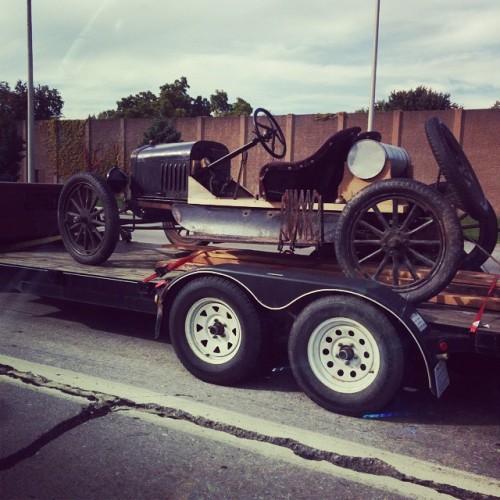 The totally awesome car we saw waiting for a tollbooth on the 90. (at NY Thruway Williamsville Toll Barrier 50)