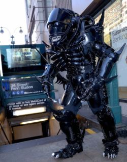 archiemcphee:  This awesome mechanized Xenomorph costume was created by professional cosplayer Peter Kokis using an impressive variety of everyday objects such as knife sharpeners, toilet plungers, drain mats, and conduit tubing. He spent 16 months simply