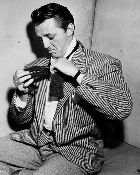 Welcome to 2017 everyone  Robert Mitchum putting on a tie circa 1950s.  #robertmitchum #vintageholly