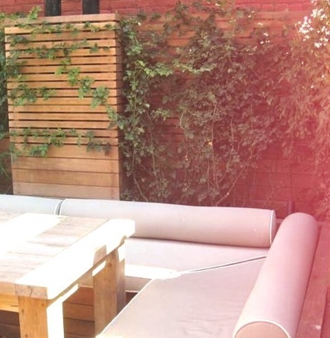 Uncovered - DeckExample Of A Large Trendy Rooftop Deck Container Garden Design With No Cover