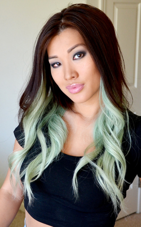 Girl with brown hair and a pastel green ombre Dying your hair can be damaging, see how to avoid it a