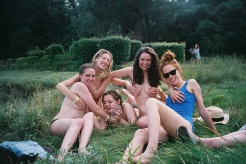 Porn photo Covering up in the grass