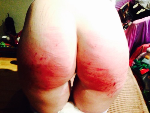 averyconfusingcouple:  So yeah…. Still didn’t learn my lesson. Kept distracting daddy from cleaning the kitchen and cooking dinner.   Ended up getting caned. Hard. Really hard.   I am going to be so bruised for the next couple of weeks. It’s funny