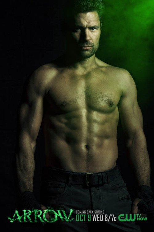 One of the most popular images in “Arrow” season one was series star Stephen Amell showing off his abs with his shirt off. In the same vein, the CW has released a series of four posters that not only show Amell shirtless, but also co-stars