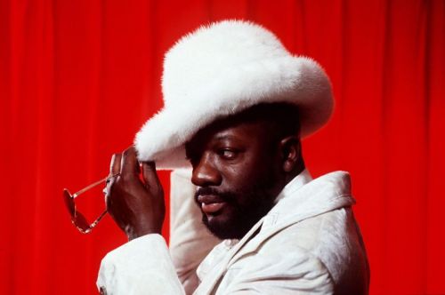 Portrait photos of Isaac Hayes in the 1960s and 1970s.