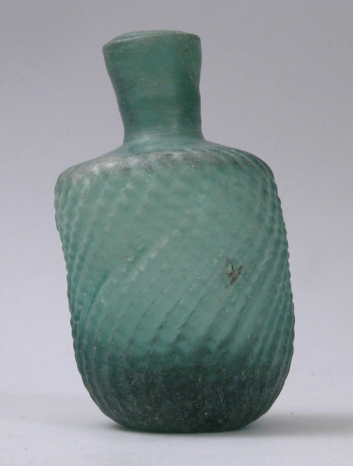 Bottle with twisted ribbing via Islamic ArtMedium: Glass, blue-green; dip-molded, blownPurchase, She