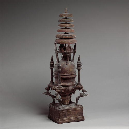 Votive bronze stupa from Gandhara, note the Corinthian capital on which the stupa is suspended.