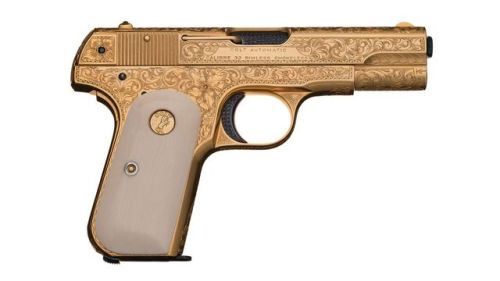 Engraved, gold plated, sapphire studded Colt Model 1903 with ivory grips. Shipped to Richards & 