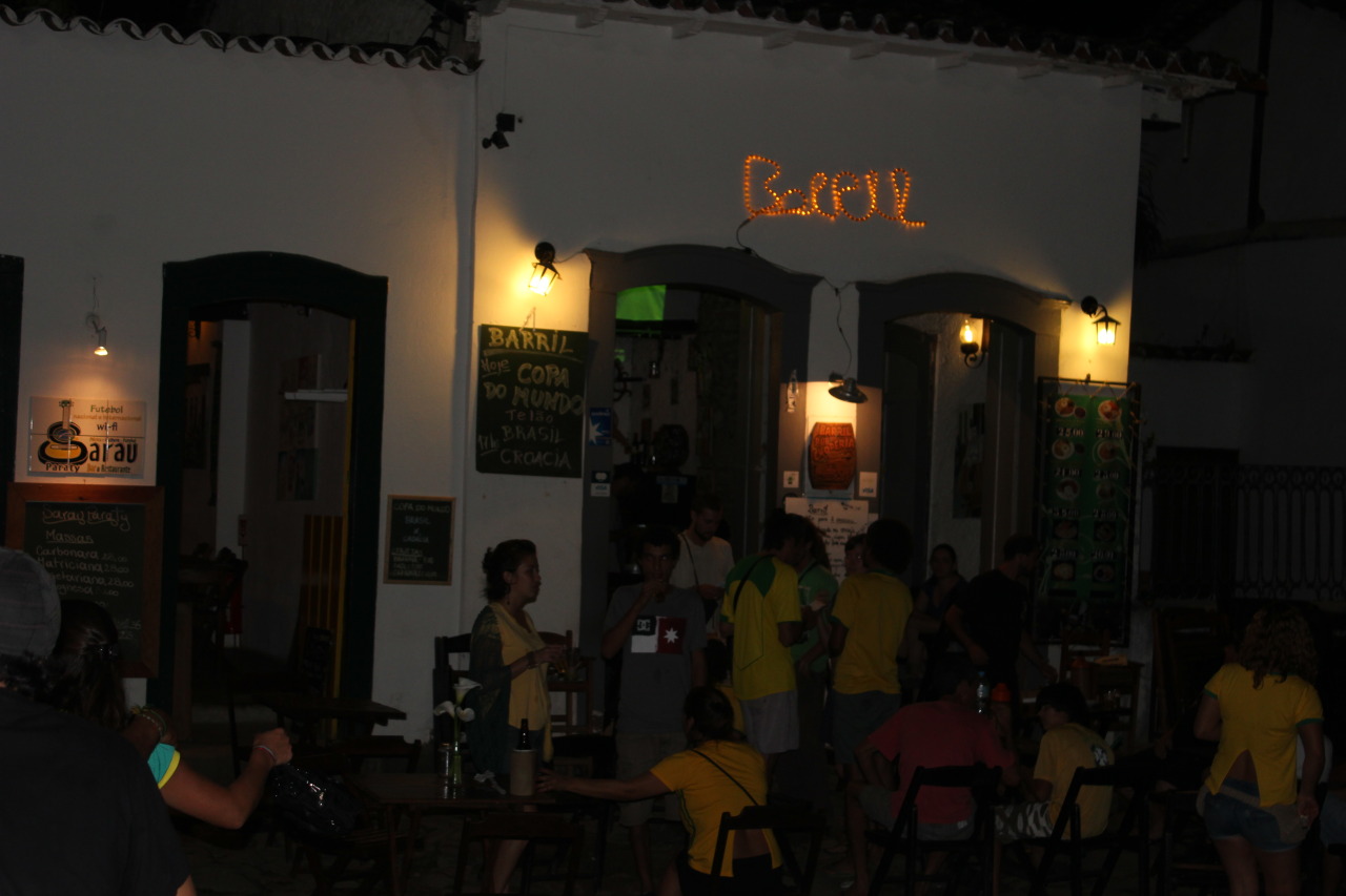 After a few days of touristing in Rio, my wife and I headed down to the coastal town of Paraty to watch the opening World Cup match with the fine folks pictured above. They were pretty devastated by the own goal (speechlessness translates in any...