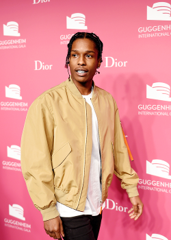 celebritiesofcolor:  ASAP Rocky attends the 2015 Guggenheim International Gala Pre-Party made possible by Dior at Solomon R. Guggenheim Museum on November 4, 2015 in New York City.   Eat my ass ASAP even though i think you fraudulent.