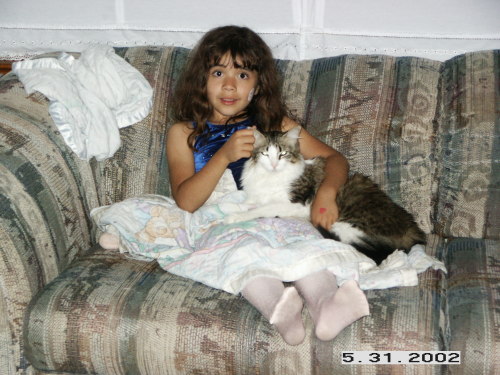 Stripy sitting with me after I came home from ballet class years ago.