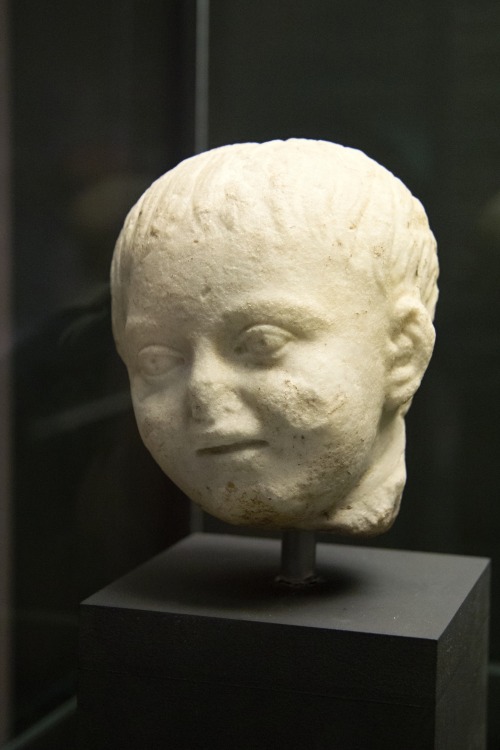 lionofchaeronea:Head of a child.  Artist unknown; 2nd cent. CE.  Now in the National Galle