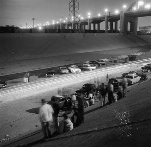 90s-forever:  therealhollywoodbandit:  Drag racing at the LA River or rather in the LA River bed. The pictures are basically self explanatory they drag race and get caught. The  picture 3rd from the bottom are some guys caught after they thought they