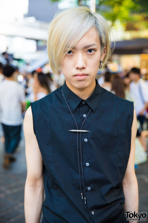 tokyo-fashion:  21-year-old Kota and 19-year-old Aoi on the street in Harajuku wearing monochrome street styles including items from Issey Miyake, Shinya Yamaguchi, Raf Simons, Vivienne Westwood, and Eatme. Full Looks