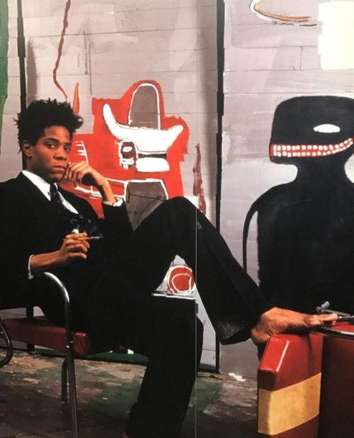 awatercolour: orwell: Jean-Michel Basquiat surrounded by his work. I have this photo hanging in my b
