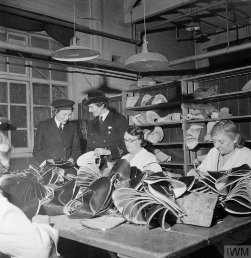 The manufacture of footwear for the Women&rsquo;s Royal Naval Service at afactory in the Midlands (E