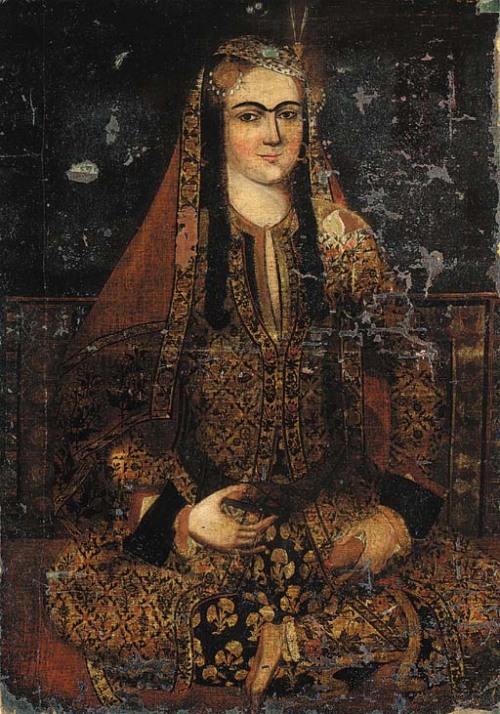 badesaba: Portrait of a lady a three-quarter length portrait of a lady seated cross-legged lean
