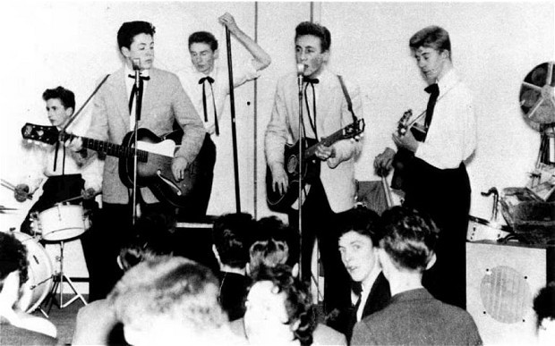 Paul McCartney (age 16) and John Lennon (age 18) playing with The Quarry Men, 1958