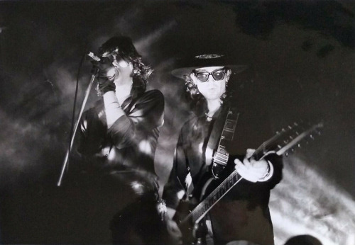 The Sisters Of Mercy, Andrew Eldritch and Wayne Hussey on stage at the Lyceum in London, 1984. Black