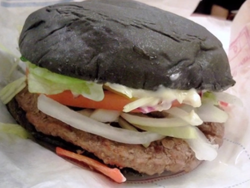 sixpenceee:  Burger King Japan is sporting an all-black burger, including the buns. The Kuro Burger has bread and cheese, both blackened by bamboo charcoal, and a special sauce made from squid ink.