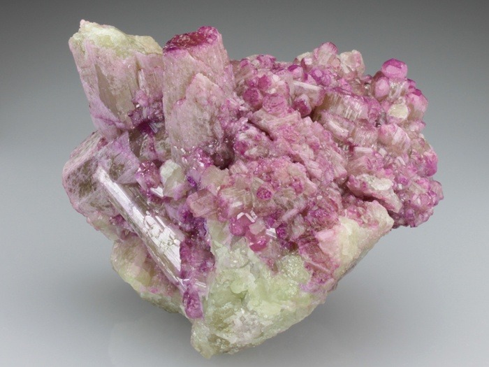 mineralists:  Violet pink Manganese enriched Vesuvianite crystals Jeffrey Mine, Canada