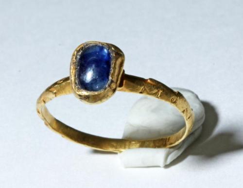 archaicwonder:Roman Gold Inscribed Ring with 20 Carat Sapphire, 1st-3rd Century AD The shank is deta