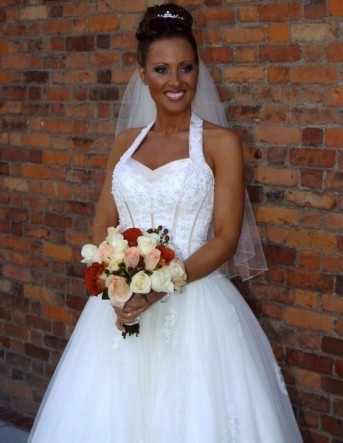 Wow! Very pretty with and without her dress.