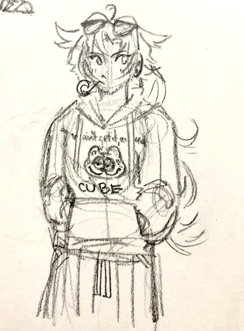 Keigetsu wears a sweatshirt that says, "we ain't get it, ain't real." Below that, "CUBE"