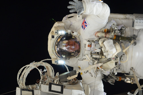 Tim Peake waves to the camera during his EVA, 15 January 2016