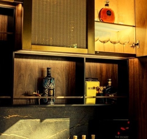 Home Bar San FranciscoDry Bar - Small Modern L-shaped Dry Bar Idea With No Sink, Glass-front Cabinets,