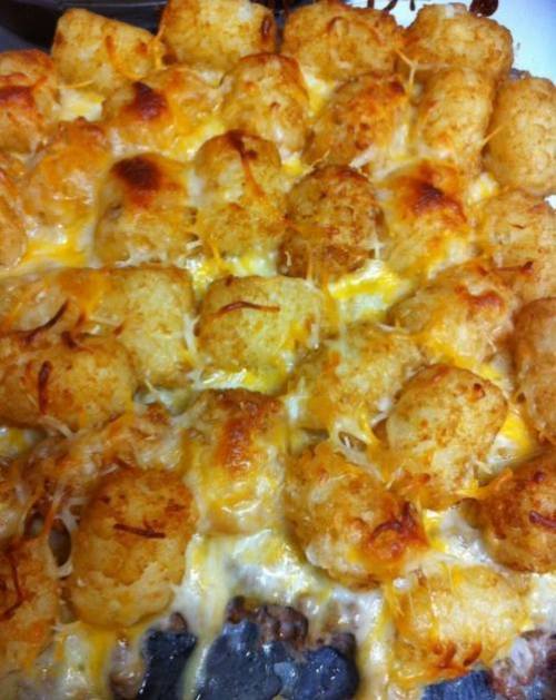 drunkcravings:  Cheesy Tot Casserole Ingredients: 1-2 lbs ground beef 1 can cream of mushroom 1 bag tater tots shredded cheese How to make it:  preheat oven to 375 brown meat in skillet; drain add cream of mushroom to meat; mix put meat/soup mixture into