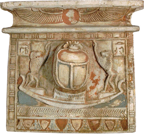 Ancient Egyptian pectoral, depicting a scarab (representing the sun god) on the sun barque, with bab