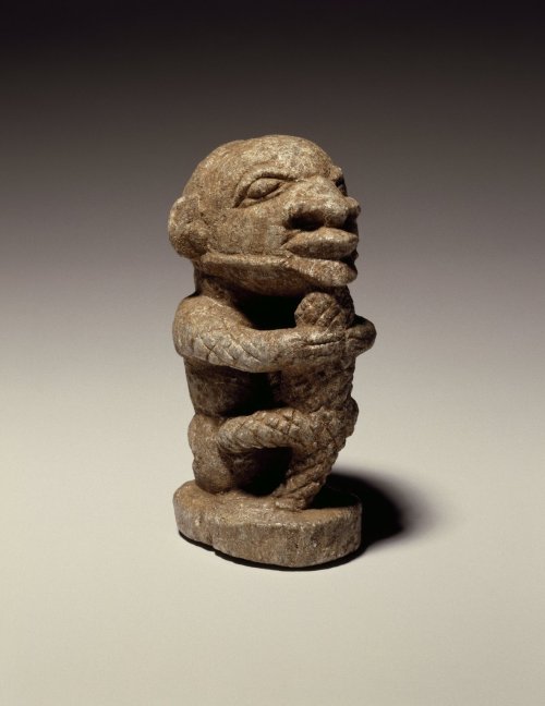Figure of a man holding a crocodile, from the Sapi culture of present-day Sierra Leone.  Artist unkn