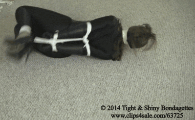 elizabethandrews:  GIF: Doublecrossed and hogtied, I roll across the floor. www.clips4sale.com/63725/10824309 - Elizabeth Andrews: Catsuited Domme Double Crossed 