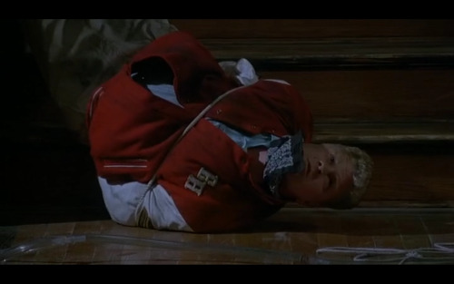 Mighty Ducks III: a bad jock captured, roped, bound