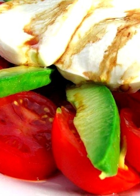 Insalata Tricolore - Vegetable Salad Sliced Beefsteak Tomatoes Are Topped With Avocado Slices And Fresh
