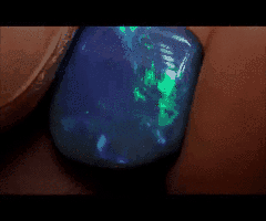 the-science-llama:  Lightning Ridge Black Opal - Twin Galaxy Gem Stones Aside from