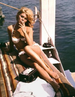 vogue:  Grace Kelly or Brigitte Bardot–which beach babe are you? Decode your surfside beauty look on Vogue.com