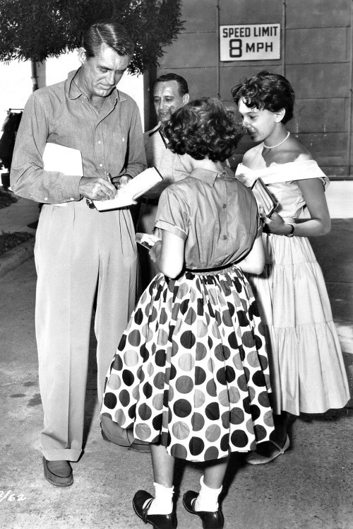 archiesleach:Cary Grant signs autographs for some fans on the set of To Catch A Thief, 1955.