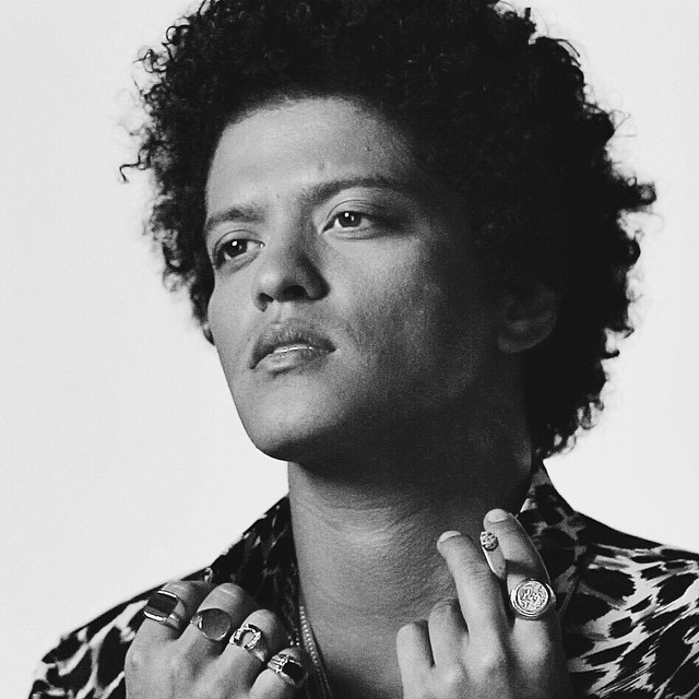bruno-news:  nativehound: @BrunoMars for Rolling Stone. Fun times emoji Bruno on